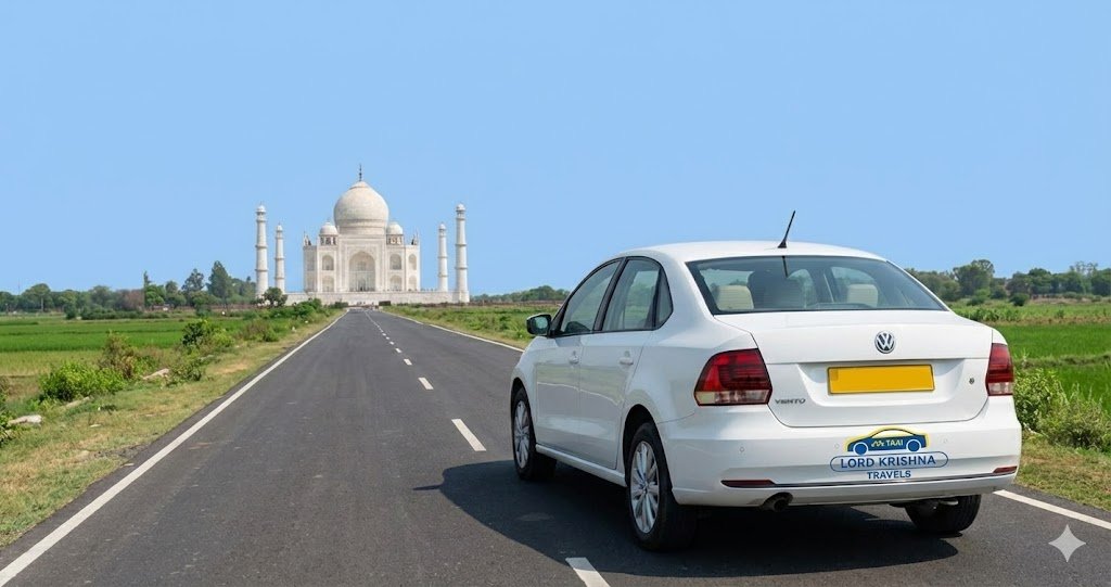 a white volkswagen vento taxi, featuring the logo and a yellow license plate.