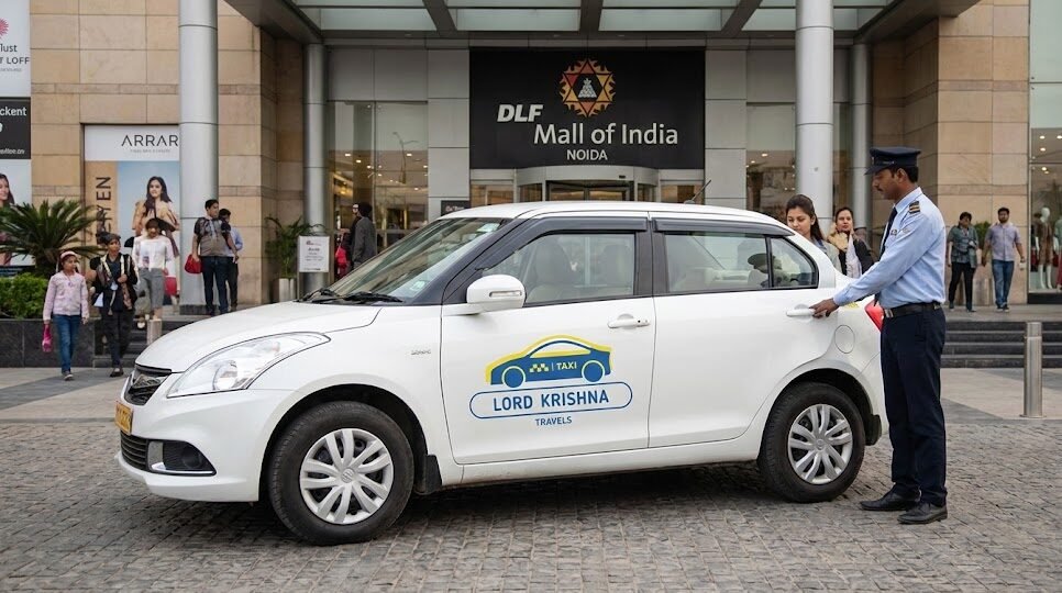 a lord krishna travels taxi with its logo parked at the entrance of dlf mall of india, noida, with a uniformed driver opening the door for a passenger.